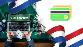 Debetkaart-logo, pokerfiches, laptop en de Nederlandse vlag