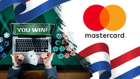 Mastercard-logo, pokerfiches, laptop en de Nederlandse vlag