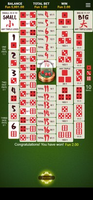 Three dice revealed and a winning sic bo bet paid