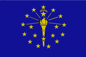 The blue state flag of Indiana with 18 gold stars and a torch. The larger 19th star above the torch symbolizes Indiana becoming the 19th U.S. state. 