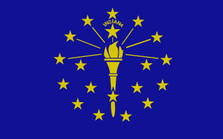 The blue state flag of Indiana with 18 gold stars and a torch. The larger 19th star above the torch symbolizes Indiana becoming the 19th U.S. state.