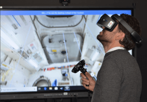 man playing VR goggles