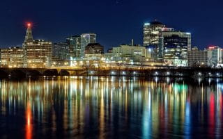 The skyline of buildings in downtown Hartford, Connecticut located on the Connecticut River.