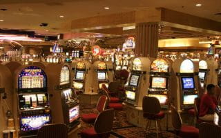 Inside a Las Vegas casino with Slot machines.