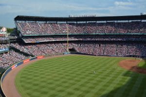 Turner Field which is the home of Major League Baseball’s Atlanta Braves featuring the green outfield, dirt infield, and stadium seating of right field.