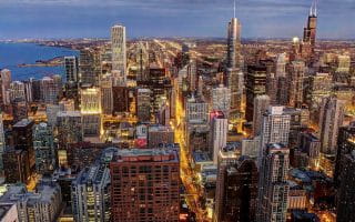 View of the Chicago skyline at night from the 360 John Hancock Center Observation Deck