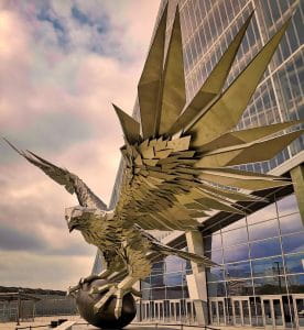 A metallic statue of a falcon grasping a football outside of Mercedes Benz Stadium, the home field of the NFL’s Atlanta Falcons