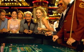 Models posing with gamblers