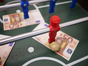 Football table with money on it 