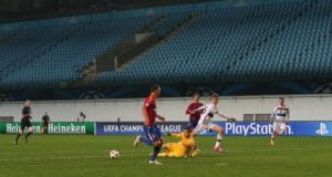 Players playing football without fans 