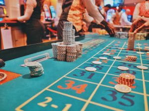 Poker chips on a table in a casino 