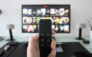 Remote control in front of a TV
