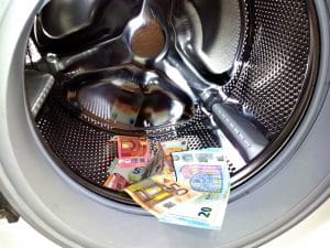 Money in a laundry machine 