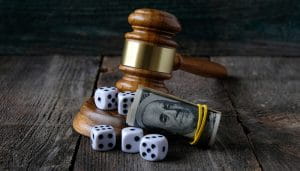 A Judge Gavel, 100 Dollar Bills and Dices 