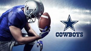 Dallas Cowboys Logo next to a Kneeling Football Player with a Ball