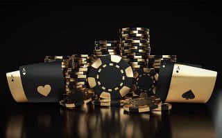 Black and Gold Casino Chips and Cards