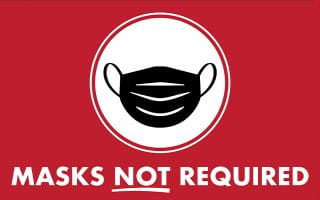 A Red Sign Saying Masks Not Required