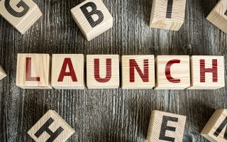 Writing "Launch" with Scrabble Tiles