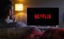 Netflix logo on distant TV screen