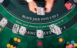 Blackjack Table with Dealt Hands