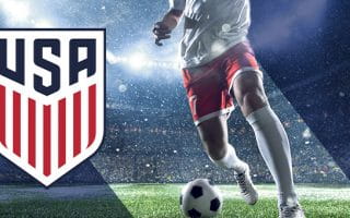 Image of USMNT player kicking a football