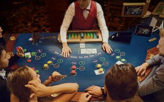 Poker players at a casino table