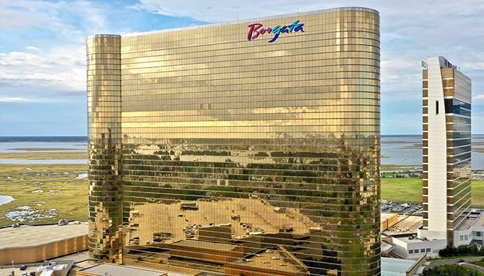 A Physical Borgata Casino Location with the Logo at the Top of the Building 