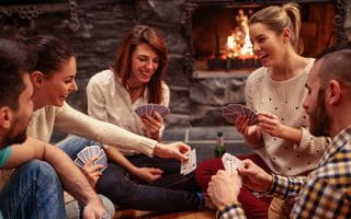 People playing cards at home