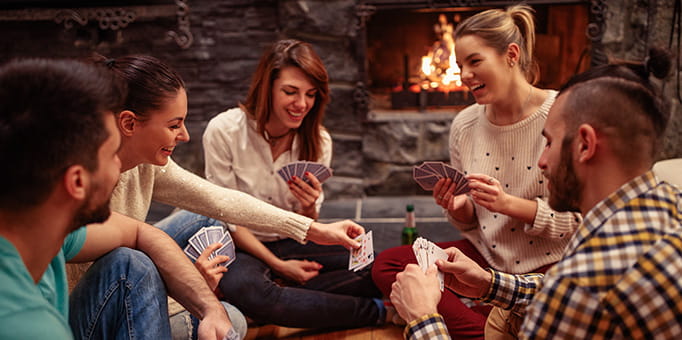 People playing cards at home
