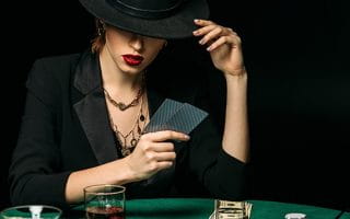 A Woman Playing A Card Game