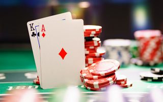 Blackjack table with card and chips 