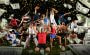 A picture of anonymous sports stars with images of cash