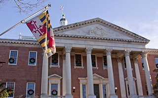Maryland flag outside the north entrance of the State House