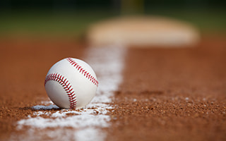 A baseball on a stadium